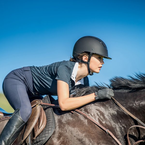 Product shot of black equestrian helmet